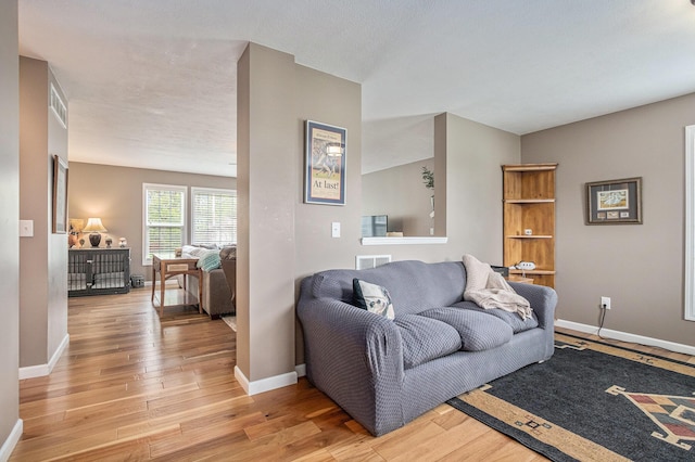 69218 Sundance Dr, Edwardsburg, MI 49112 - living room with baseboards and light wood finished floors