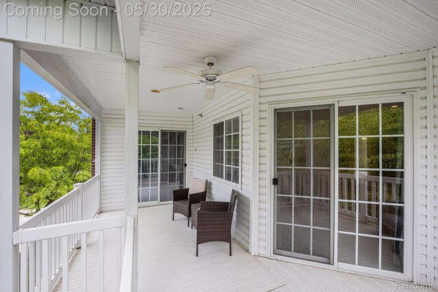 6769 Boulder Pointe Dr, Washington, MI 48094 - deck featuring a ceiling fan