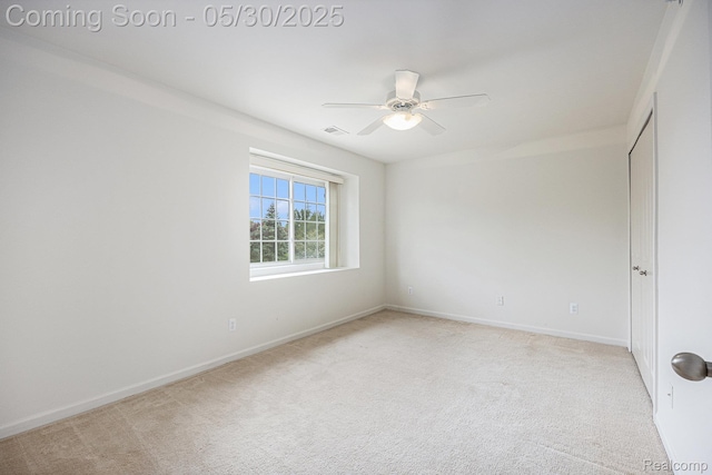 6769 Boulder Pointe Dr, Washington, MI 48094 - unfurnished room featuring light colored carpet, ceiling fan, and baseboards