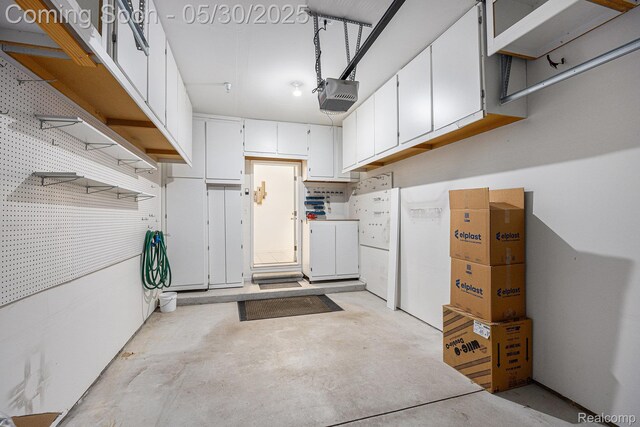 6769 Boulder Pointe Dr, Washington, MI 48094 - garage with a garage door opener