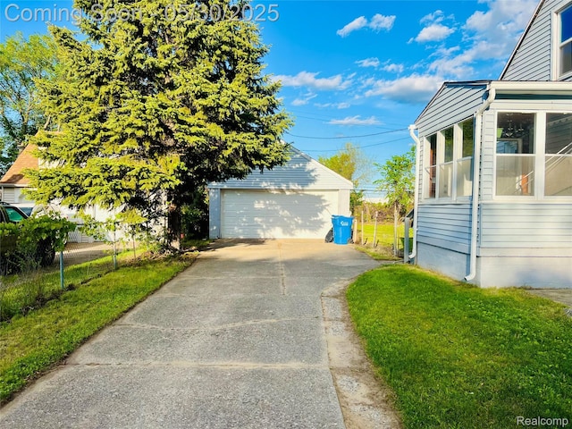 22380 Panama Ave, Sterling Heights, MI 48091 - view of home's exterior with an outbuilding and a garage