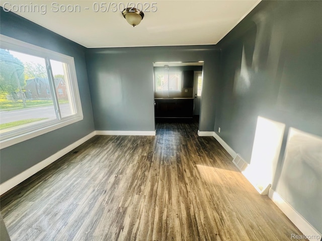22380 Panama Ave, Sterling Heights, MI 48091 - empty room with baseboards and wood finished floors