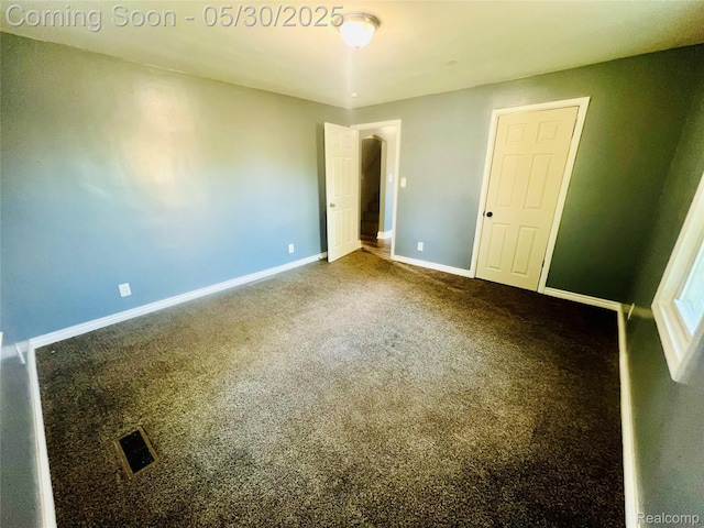 22380 Panama Ave, Sterling Heights, MI 48091 - unfurnished bedroom with baseboards and carpet flooring