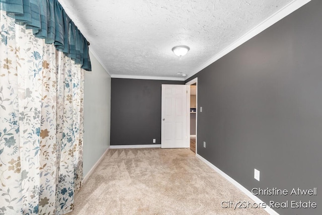 11943 Mulliken Rd, Mulliken, MI 48861 - spare room with carpet, baseboards, crown molding, and a textured ceiling