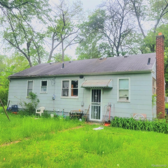 15440 Dacosta St, Detroit, MI 48223 - back of house with roof with shingles