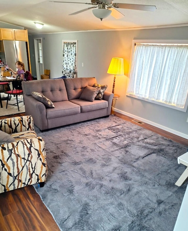 6334 N 168th Ave, Walkerville, MI 49459 - living room with wood finished floors, ceiling fan, crown molding, and baseboards