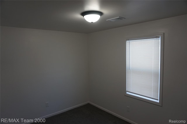 26017 Stanford St, Inkster, MI 48141 - empty room featuring baseboards and dark carpet