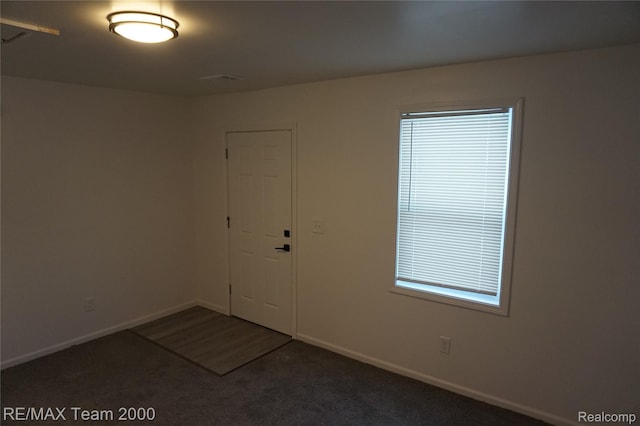 26017 Stanford St, Inkster, MI 48141 - carpeted empty room featuring baseboards