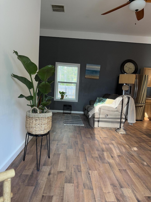1581 W Lone Pine Dr, Baldwin, MI 49304 - interior space with wood finished floors, ceiling fan, and baseboards