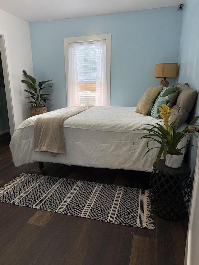 1581 W Lone Pine Dr, Baldwin, MI 49304 - bedroom featuring wood finished floors