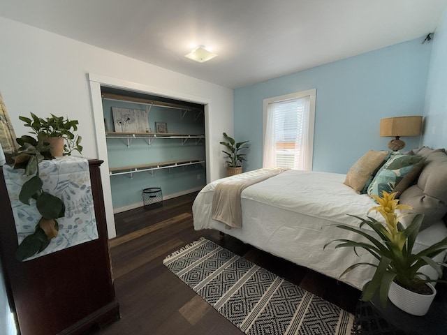 1581 W Lone Pine Dr, Baldwin, MI 49304 - bedroom featuring wood finished floors and baseboards