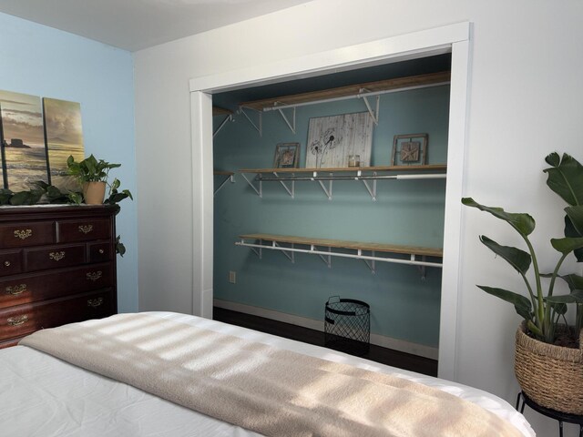 1581 W Lone Pine Dr, Baldwin, MI 49304 - bedroom featuring baseboards