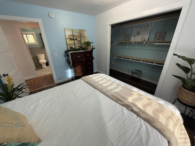 1581 W Lone Pine Dr, Baldwin, MI 49304 - bedroom with wood finished floors and baseboards