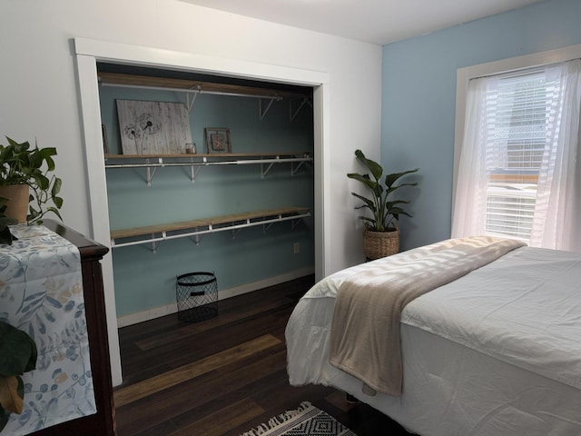1581 W Lone Pine Dr, Baldwin, MI 49304 - bedroom with wood finished floors and baseboards