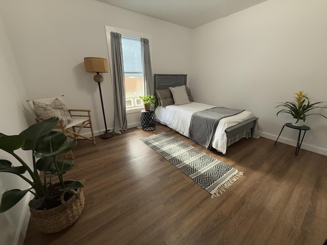 1581 W Lone Pine Dr, Baldwin, MI 49304 - bedroom with wood finished floors and baseboards