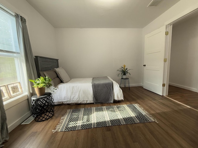 1581 W Lone Pine Dr, Baldwin, MI 49304 - bedroom featuring wood finished floors and baseboards
