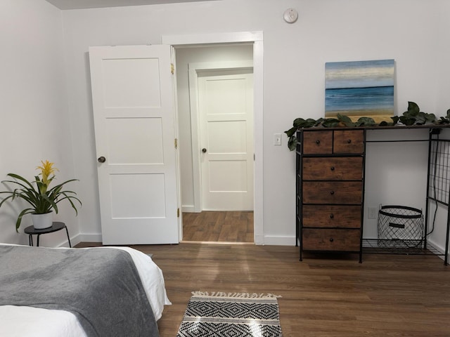1581 W Lone Pine Dr, Baldwin, MI 49304 - bedroom featuring wood finished floors and baseboards