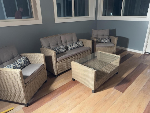 1581 W Lone Pine Dr, Baldwin, MI 49304 - living room with wood finished floors and baseboards