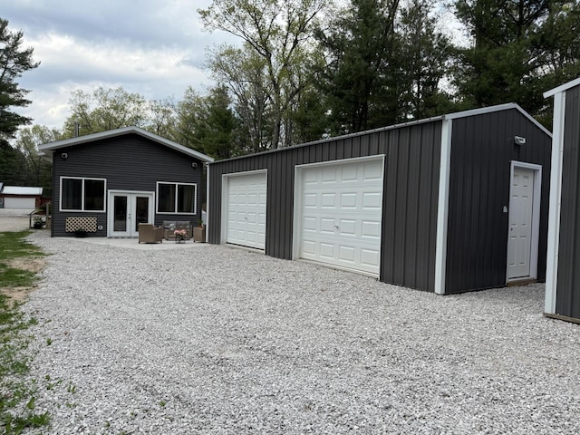 1581 W Lone Pine Dr, Baldwin, MI 49304 - detached garage featuring french doors