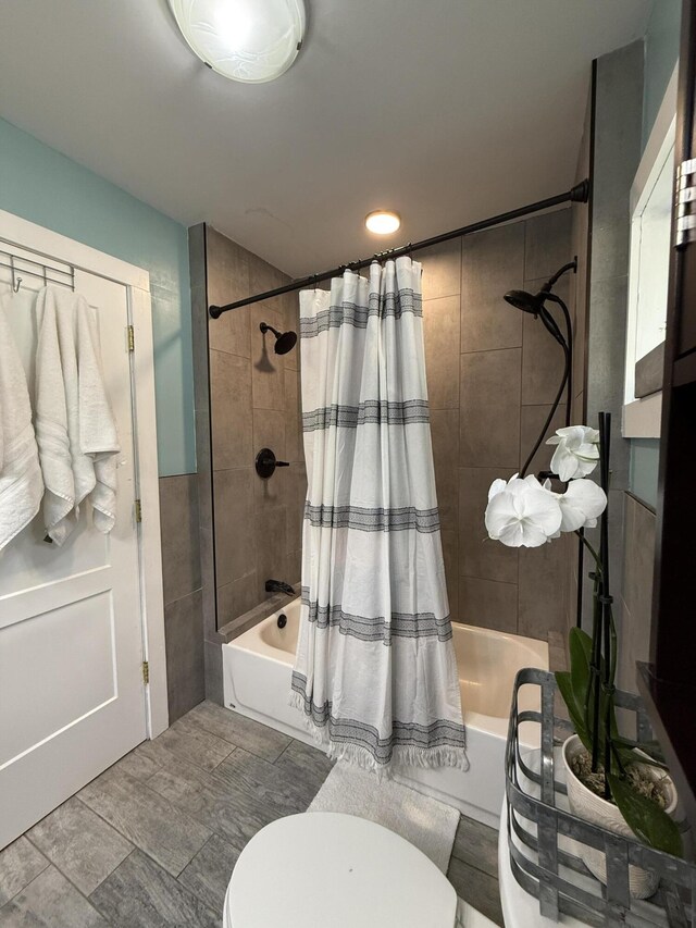 1581 W Lone Pine Dr, Baldwin, MI 49304 - bathroom with shower / tub combo, toilet, and recessed lighting