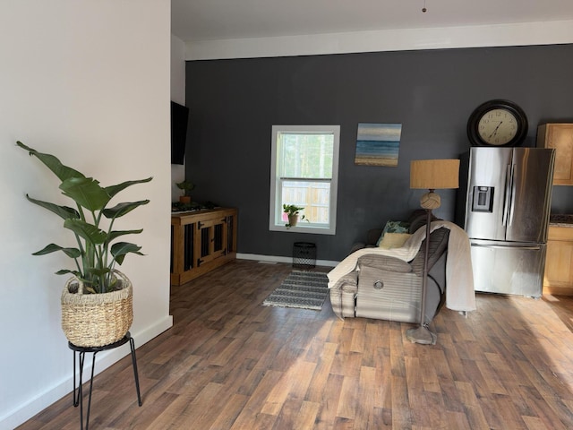 1581 W Lone Pine Dr, Baldwin, MI 49304 - living area featuring wood finished floors and baseboards