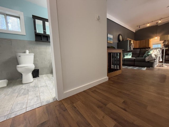 1581 W Lone Pine Dr, Baldwin, MI 49304 - living area with rail lighting and wood finished floors