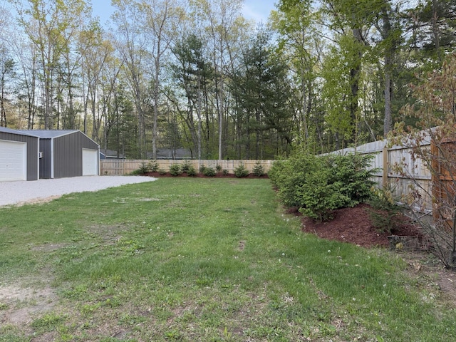 1581 W Lone Pine Dr, Baldwin, MI 49304 - view of yard with an outdoor structure and a garage