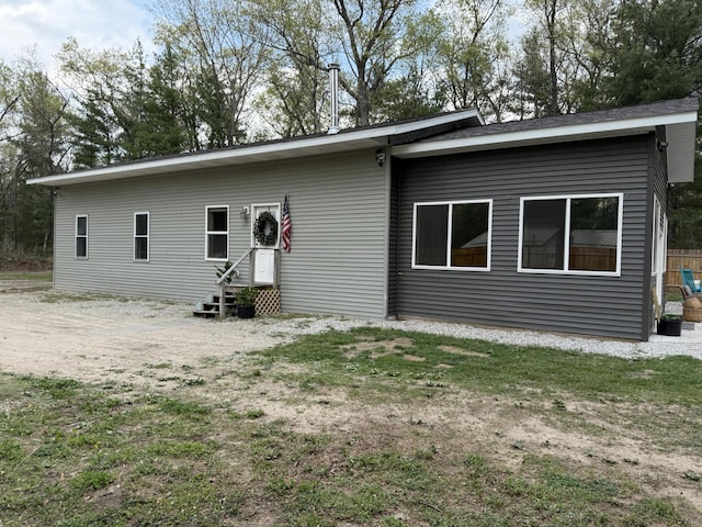 1581 W Lone Pine Dr, Baldwin, MI 49304 - back of house featuring entry steps