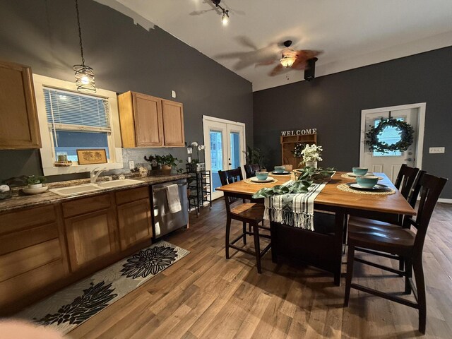 1581 W Lone Pine Dr, Baldwin, MI 49304 - kitchen with dishwasher, a sink, ceiling fan, french doors, and wood finished floors