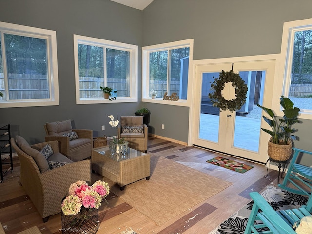 1581 W Lone Pine Dr, Baldwin, MI 49304 - living room featuring wood finished floors and french doors