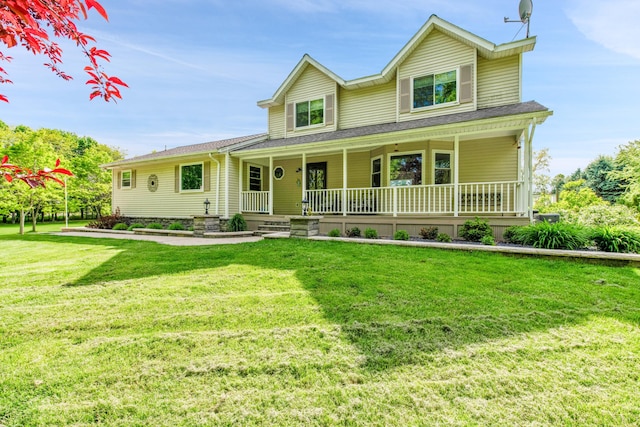 5576 Kidder Rd, Almont, MI 48003 - view of front facade featuring covered porch, a front yard, and a shingled roof
