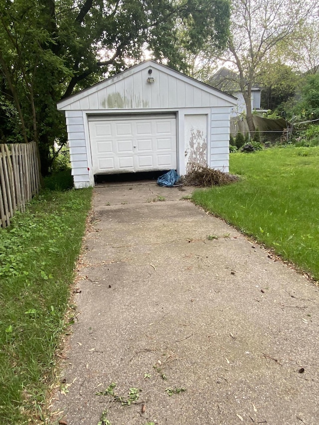525 NE Eastern Ave NE, Grand Rapids, MI 49503 - detached garage featuring asphalt driveway