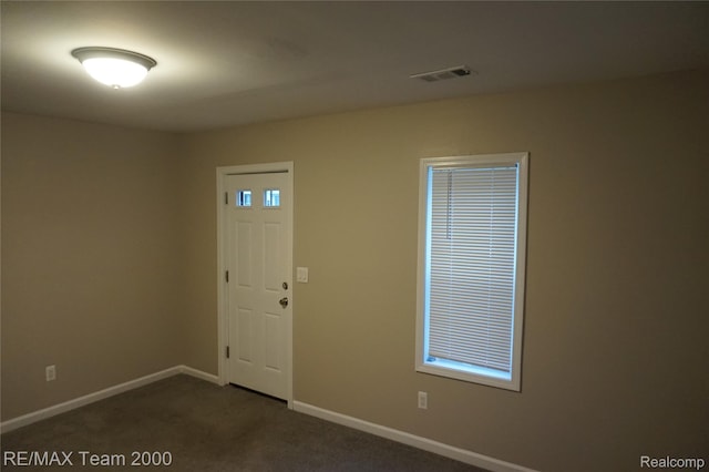 29619 Hazelwood St, Inkster, MI 48141 - entryway featuring baseboards and dark colored carpet