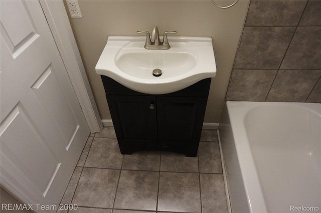 29619 Hazelwood St, Inkster, MI 48141 - full bathroom featuring tile patterned floors, a bathtub, and vanity