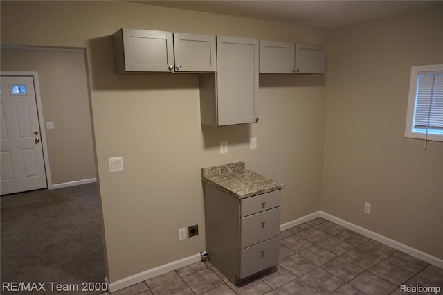 29619 Hazelwood St, Inkster, MI 48141 - kitchen with light tile patterned flooring and baseboards
