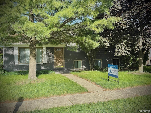31322 Leota St, Fraser, MI 48026 - obstructed view of property with a front yard