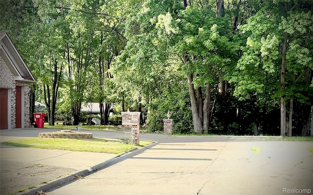 31322 Leota St, Fraser, MI 48026 - view of concrete road with curbs