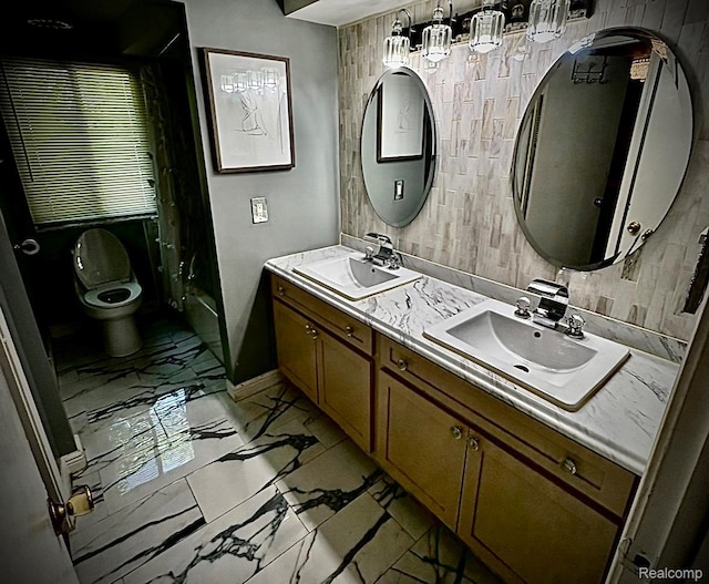 31322 Leota St, Fraser, MI 48026 - bathroom featuring marble finish flooring, toilet, double vanity, a chandelier, and baseboards