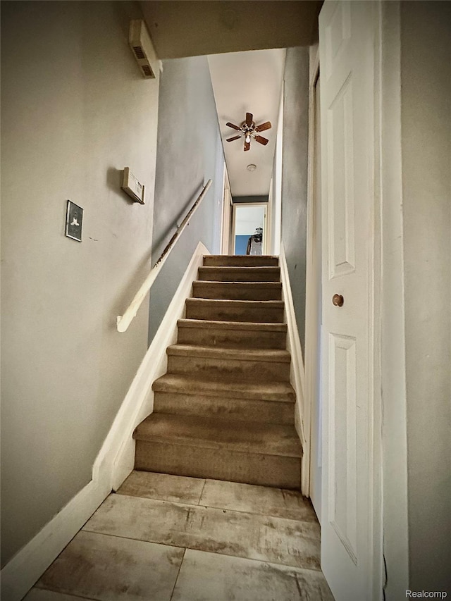 31322 Leota St, Fraser, MI 48026 - stairway with a ceiling fan and baseboards
