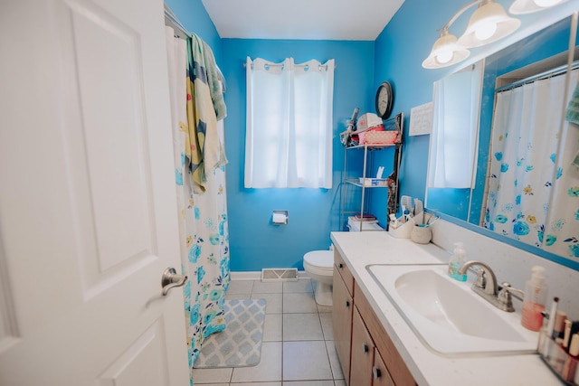 1905 Ora St, Muskegon, MI 49445 - bathroom with tile patterned floors, vanity, toilet, baseboards, and curtained shower