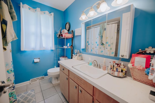 1905 Ora St, Muskegon, MI 49445 - full bathroom featuring vanity, tile patterned floors, toilet, baseboards, and a shower with curtain