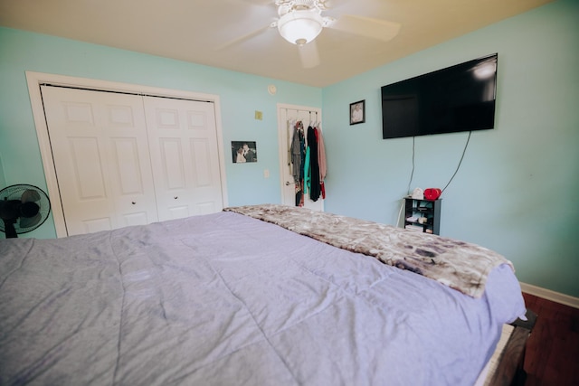 1905 Ora St, Muskegon, MI 49445 - bedroom with wood finished floors, ceiling fan, and baseboards