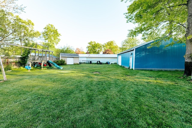 1905 Ora St, Muskegon, MI 49445 - view of yard with a playground and an outbuilding