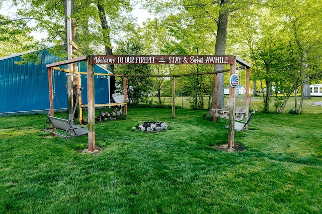 1905 Ora St, Muskegon, MI 49445 - view of play area featuring a fire pit