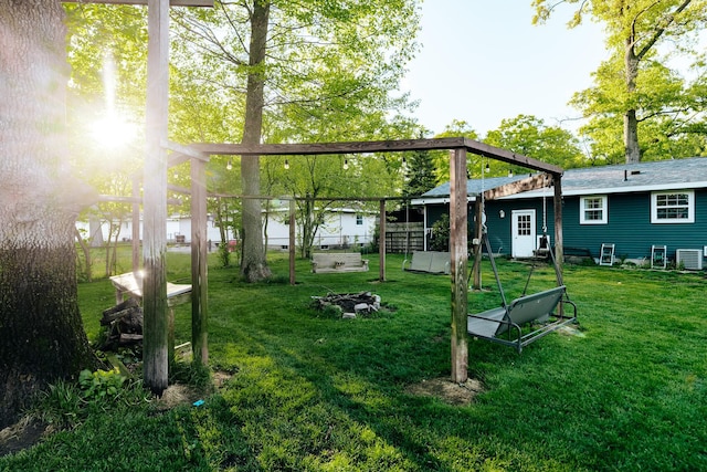 1905 Ora St, Muskegon, MI 49445 - view of grassy yard featuring central AC