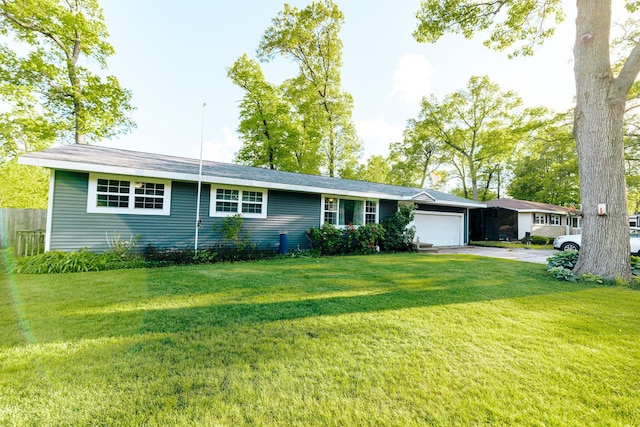 1905 Ora St, Muskegon, MI 49445 - single story home with asphalt driveway and a garage