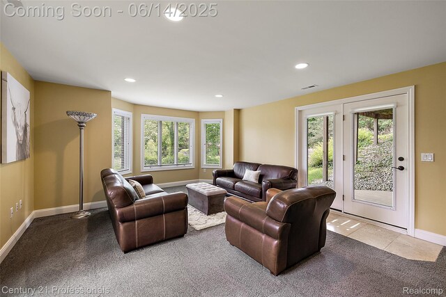 1181 Iroquois Trl, Oxford, MI 48371 - living room featuring carpet floors and recessed lighting