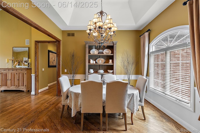 1181 Iroquois Trl, Oxford, MI 48371 - dining room featuring a chandelier and wood finished floors