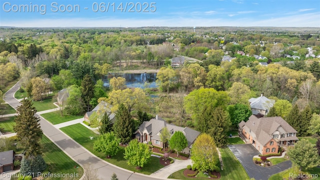 1181 Iroquois Trl, Oxford, MI 48371 - aerial view of residential area with a nearby body of water