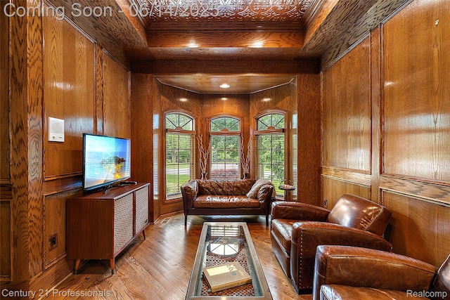 1181 Iroquois Trl, Oxford, MI 48371 - living room featuring wooden walls and hardwood / wood-style floors